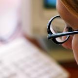 woman reading on a computer